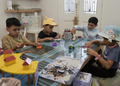 Palestinian children who were brought to Lebanon from the Gaza Strip for treatment, play at a summer camp in Beirut, Lebanon, Friday, Aug. 30, 2024. (AP Photo/Bilal Hussein)