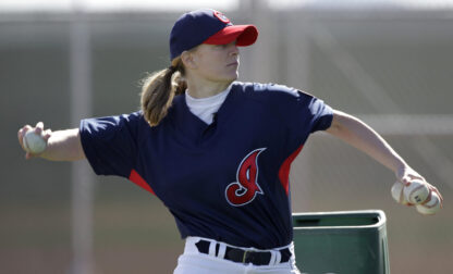 FILE - Justine Siegal throws during batting practice to Cleveland Indians minor leaguers during spring training, Feb. 21, 2011, in Goodyear, Ariz. (AP Photo/Mark Duncan, File)