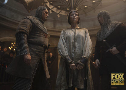 This image released by Fox Nation shows Liah O'Prey as Joan of Arc, center, in a scene from 