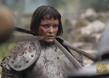 This image released by Fox Nation shows Liah O'Prey as Joan of Arc, center, in a scene from 