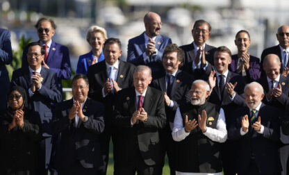 Leaders attending the G20 Summit pose for a group photo in Rio de Janeiro, Monday, Nov. 18, 2024. (AP Photo/Eraldo Peres)