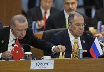 Turkey's President Recep Tayyip Erdogan, left, and Russia's Foreign Minister Sergey Lavrov attend the G20 Summit leaders meeting in Rio de Janeiro, Monday, Nov. 18, 2024. (AP Photo/Eraldo Peres)