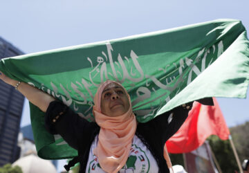 A demonstrator shows solidarity with the Palestinian people as leaders meet at the G20 summit in Rio de Janeiro, Monday, Nov. 18, 2024. (AP Photo/Bruna Prado)