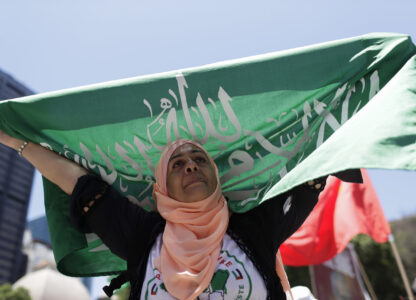 A demonstrator shows solidarity with the Palestinian people as leaders meet at the G20 summit in Rio de Janeiro, Monday, Nov. 18, 2024. (AP Photo/Bruna Prado)