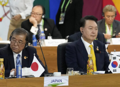 Japan's Prime Minister Shigeru Ishiba, left, and South Korea's President Yoon Suk Yeol attend the G20 Summit leaders meeting in Rio de Janeiro, Monday, Nov. 18, 2024. (AP Photo/Eraldo Peres)