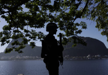 A soldier patrols the perimeters of the Museum of Modern Art, the venue of the G20 summit in Rio de Janeiro, Monday, Nov. 18, 2024. (AP Photo/Bruna Prado)