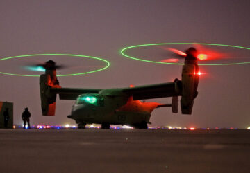 FILE - A V-22 Osprey tilt rotor aircraft taxi's during a mission in western Iraqi desert, Oct. 13, 2008. (AP Photo/Dusan Vranic, File)