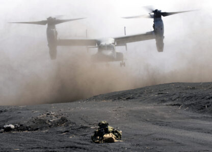 FILE - An MV-22 Osprey takes off as Japan Ground Self-Defense Force guards the landing zone during a joint military drill with U.S. Marines in Gotemba, southwest of Tokyo, March 15, 2022. (AP Photo/Eugene Hoshiko, File)