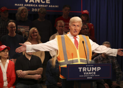 This image released by NBC shows James Austin Johnson portraying Donald Trump during the 