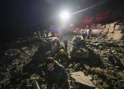 FILE - Rescuers search for survivors after an Israeli airstrike in Baalchmay village east of Beirut, Lebanon, on Nov. 12, 2024. (AP Photo/Hassan Ammar, File)