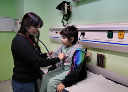 Doctor Dolly Noun, a pediatric hematologist and oncologist, checks Carol Zeghayer, 9, a girl who suffers from leukaemia ahead of her treatment at the Children's Cancer Center of Lebanon, in Beirut, Lebanon, Friday, Nov. 15, 2024. (AP Photo/Hussein Malla)