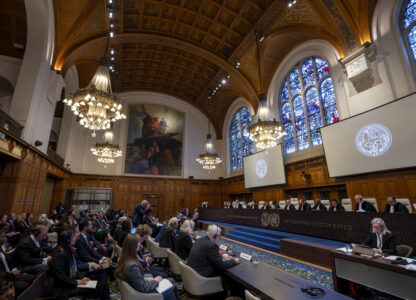 Judges are seated as the International Court of Justice in The Hague, Netherlands, opens hearings into what countries worldwide are legally required to do to combat climate change and help vulnerable nations fight its devastating impact, Monday, Dec. 2, 2024. (AP Photo/Peter Dejong)