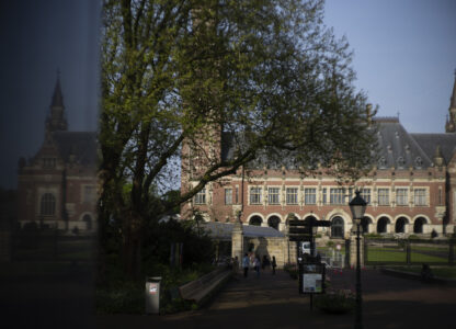 FILE - The Peace Palace housing the World Court, or International Court of Justice, is reflected in a monument in The Hague, Netherlands, Wednesday, May 1, 2024. (AP Photo/Peter Dejong, File)