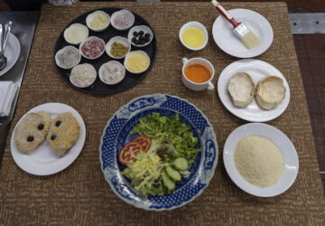 Ingredients for making baked crabmeat lie on a table at the family-run Restaurante Litoral in Macao, on Nov. 11, 2024. (AP Photo/Anthony Kwan)