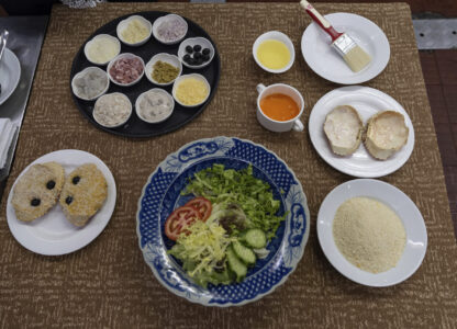 Ingredients for making baked crabmeat lie on a table at the family-run Restaurante Litoral in Macao, on Nov. 11, 2024. (AP Photo/Anthony Kwan)