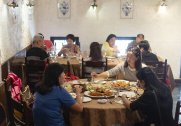 Customers dine during lunch hour at the family-run Restaurante Litoral in Macao, on Nov. 11, 2024. (AP Photo/Anthony Kwan)