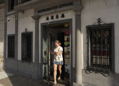 A customer exits the family-run Restaurante Litoral in Macao, on Nov. 11, 2024. (AP Photo/Anthony Kwan)