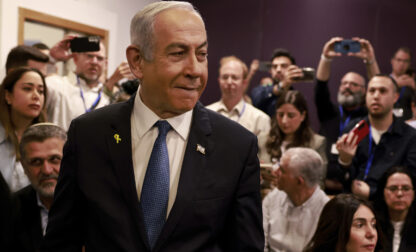 Israeli Prime Minister Benjamin Netanyahu arrives at the district court for his long-running trial for alleged corruption, in Tel Aviv, Israel, Tuesday, Dec. 10, 2024. (Menahem Kahana/Pool Photo via AP)