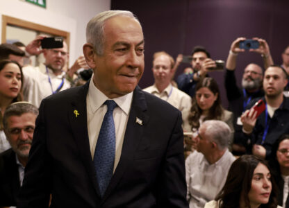 Israeli Prime Minister Benjamin Netanyahu arrives at the district court for his long-running trial for alleged corruption, in Tel Aviv, Israel, Tuesday, Dec. 10, 2024. (Menahem Kahana/Pool Photo via AP)