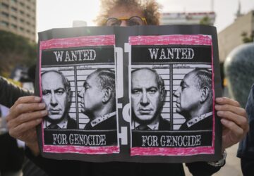 Demonstrators protest against Prime Minster Benjamin Netanyahu outside the court in Tel Aviv Tuesday Dec. 10, 2024. Netanyahu is set to take the stand on Tuesday in his long-running trial for alleged corruption.(AP Photo/Ariel Schalit)