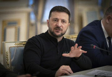 Ukrainian President Volodymyr Zelenskyy talks during his meeting with the Chairman of the German Christian Democratic Party (CDU) Friedrich Merz in Kyiv, Ukraine, Monday, Dec. 9, 2024. (AP Photo/Efrem Lukatsky)