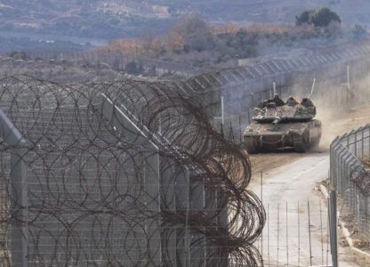 An Israeli army tank maneuvers near the so-called Alpha Line that separates the Israeli-annexed Golan Heights from Syria, in the town of Majdal Shams, Wednesday, Dec. 11, 2024. (AP Photo/Matias Delacroix)