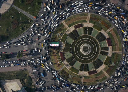 An arial view shows central Damascus' Umayyad Square as Syrians display the revolutionary flag to celebrate on the second day of the insurgents' takeover of the city in Damascus, Syria, on Monday, Dec. 9, 2024. (AP Photo/Ghaith Alsayed)