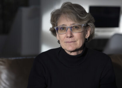 Two-time Olympian Joan Wilder poses for a photo at her home on Nov. 22, 2024, in Bend, Ore. (AP Photo/Jenny Kane)