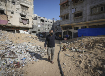 Ahmed Algharbli shows the area where he last saw his father, Mahmoud Alghrabli, in Khan Younis, Gaza Strip, Nov. 21, 2024. (AP Photo/Abdel Kareem Hana)