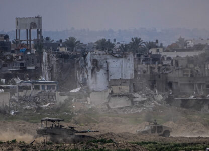 FILE - Israeli soldiers operate inside the Gaza Strip, as seen from southern Israel, Feb. 13, 2024. (AP Photo/Ariel Schalit, File)