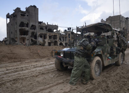 FILE - An Israeli soldier stands guard in Khan Younis, Jan. 27, 2024. (AP Photo/Sam McNeil, File)