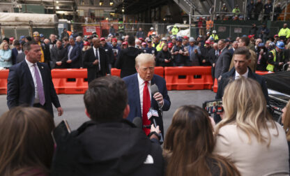 FILE - Former President Donald Trump speaks members of the media while visiting with construction workers at the construction site of the new JPMorgan Chase headquarters in midtown Manhattan, Thursday, April 25, 2024, in New York. Trump met with construction workers and union representatives hours before he's set to appear in court. (AP Photo/Yuki Iwamura, File)