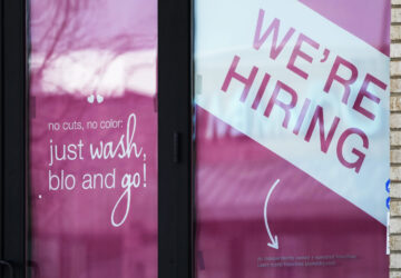 FILE - A hiring sign is displayed at a hair salon in Vernon Hills, Ill., March 28, 2023. (AP Photo/Nam Y. Huh, File)