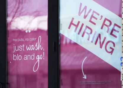 FILE - A hiring sign is displayed at a hair salon in Vernon Hills, Ill., March 28, 2023. (AP Photo/Nam Y. Huh, File)