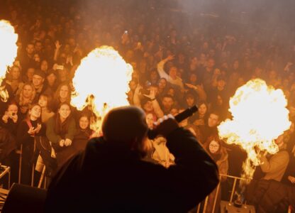 The crowd reacts to the performance of rap band PVNCH during the presentation of the music album Epoch, a collaboration between Ukrainian artists and the 3rd Assault Brigade, in Kyiv, Ukraine, Saturday, Dec. 7, 2024. (AP Photo/Alex Babenko)