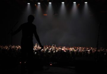 The Crowd react during the performance of punk rock band Hatespeech during the presentation of the music album Epoch, a collaboration between Ukrainian artists and the 3rd Assault Brigade, in Kyiv, Ukraine, Saturday, Dec. 7, 2024. (AP Photo/Alex Babenko)