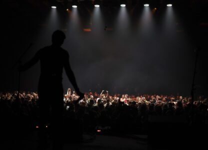 The Crowd react during the performance of punk rock band Hatespeech during the presentation of the music album Epoch, a collaboration between Ukrainian artists and the 3rd Assault Brigade, in Kyiv, Ukraine, Saturday, Dec. 7, 2024. (AP Photo/Alex Babenko)