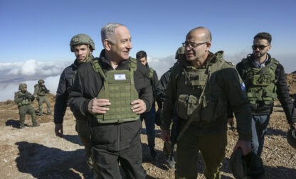 Israel's Prime Minister Benjamin Netanyahu, left, visits Israeli forces in a buffer zone inside Syria, Tuesday, Dec. 17, 2024. (Israel Government Press Office via AP)