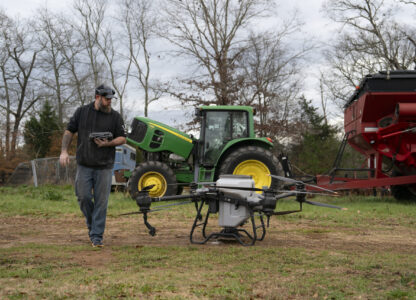 Russell Hedrick prepares a DJI drone to put crop cover on his farm, Tuesday, Dec. 17, 2024, in Hickory, N.C. (AP Photo/Allison Joyce)