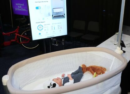 Bosch showcases the Revol Intelligent Crib, which monitors the baby's vital signs and can automatically rock if the baby is crying, during 2025 CES Unveiled, Sunday, Jan. 5, 2025, in Las Vegas. (AP Photo/Jack Dempsey)