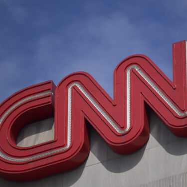 FILE - Signage is seen at the CNN Center in Atlanta on April 21, 2022. (AP Photo/Mike Stewart, File)