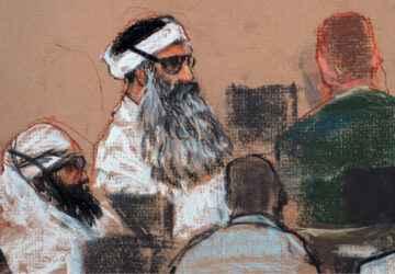 FILE - This Monday, Dec. 8, 2008 courtroom drawing by artist Janet Hamlin and reviewed by the U.S. military, shows Khalid Sheikh Mohammed, center, and co-defendant Walid Bin Attash, left, attending a pre-trial session at Guantanamo Bay Naval Base, Cuba. (AP Photo/Janet Hamlin, Pool, File)