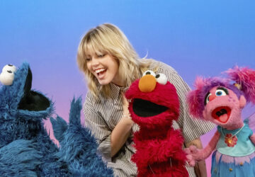 This image released by Sesame Workshop shows actor-singer Renee Rapp with muppet characters Cookie Monster, from left, Elmo and Abby Cadabby on the set of 