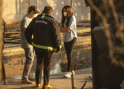 Meghan Markle, Duchess of Sussex, right, speaks with Pasadena Mayor Victor Gordo, center, and Doug Goodwin, who's home was destroyed by the Eaton Fire, in Altadena, Calif., Friday, Jan. 10, 2025. (AP Photo/Ethan Swope)