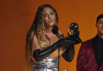 FILE - Beyonce accepts the award for best dance/electronic music album for 