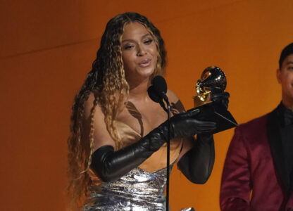 FILE - Beyonce accepts the award for best dance/electronic music album for 