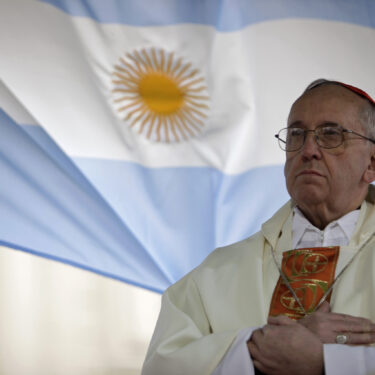 FILE - Argentina's Cardinal Jorge Bergoglio giving a mass outside the San Cayetano church in Buenos Aires, Aug. 7, 2009. (AP Photo/Natacha Pisarenko, File)