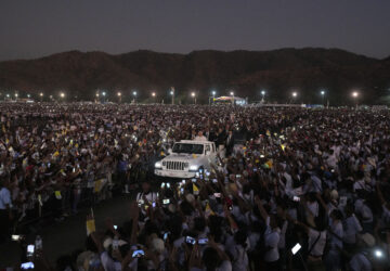 FILE - Pope Francis leaves after leading a holy mass at Tasitolu park in Dili, East Timor, Sept. 10, 2024. (AP Photo/Firdia Lisnawati, File)