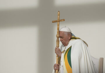 FILE - Pope Francis holds the pastoral staff as he presides over the Sunday mass at King Baudouin Stadium, in Brussels Sunday, Sept. 29, 2024. (AP Photo/Andrew Medichini)