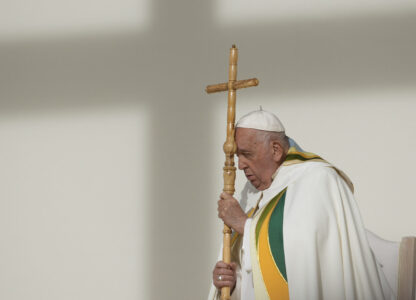 FILE - Pope Francis holds the pastoral staff as he presides over the Sunday mass at King Baudouin Stadium, in Brussels Sunday, Sept. 29, 2024. (AP Photo/Andrew Medichini)